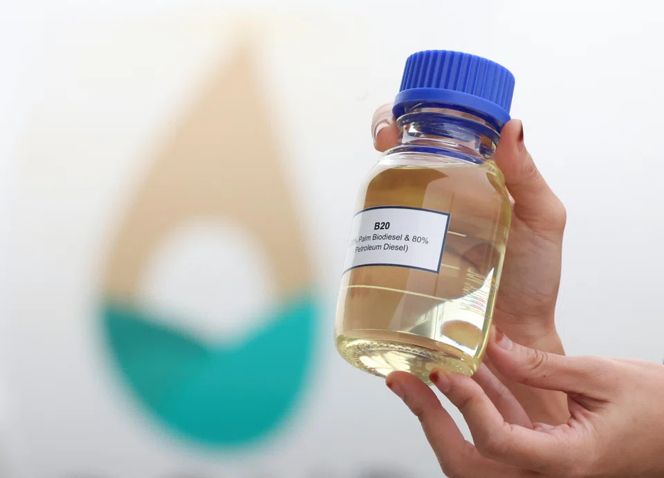A bottle of B20 biodiesel, composed of 20% palm oil and 80% petroleum, is displayed at Sepang, Malaysia on May 29.