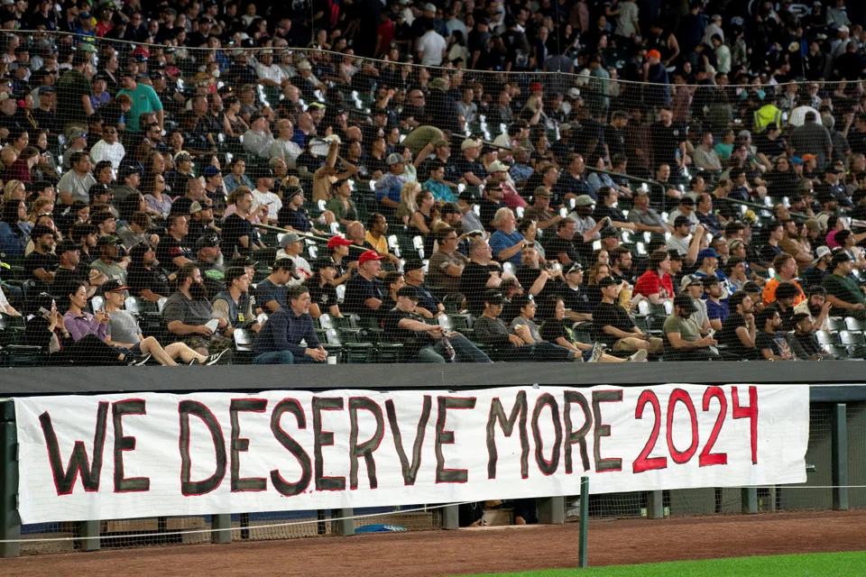 Boeing workers listen to union leaders speak as Boeing's Washington state factory workers vote on whether to give their union a strike mandate as they seek big salary gains from their first contract in 16 years, at T-Mobile Park in Seattle, Washington, July 17, 2024. Boeing agreed on a preliminary new contract with union leaders that includes a hefty wage hike that would avert a strike in the Seattle region, both sides said on Sunday. 