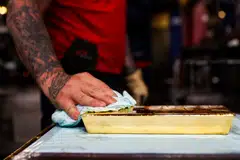 The precious metal has held above the US$5,000-an-ounce level, finding some support as a haven asset during a period of geopolitical and trade upheaval. 