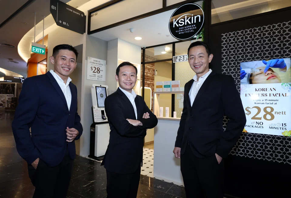 KC Group co-founders (from left) Brian Ng, Bernard Ng and Samuel Pei at an outlet of facial brand Kskin, which is the biggest contributor to the company's sales.