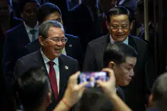 Chinese Premier Li Qiang (left) and Lao Prime Minister Sonexay Siphandone at the 27th Asean-China Summit in Laos on Oct 10, 2024.