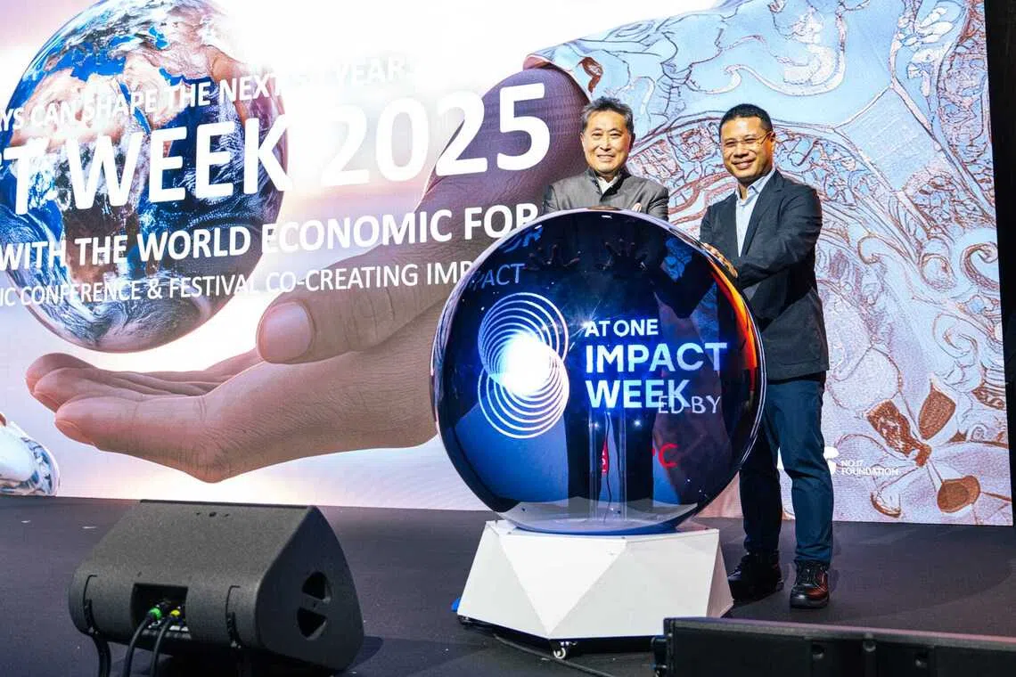 Chavalit Frederick Tsao (left), who chairs family business Tsao Pao Chee, with Education Minister Desmond Lee at the Impact Week event.