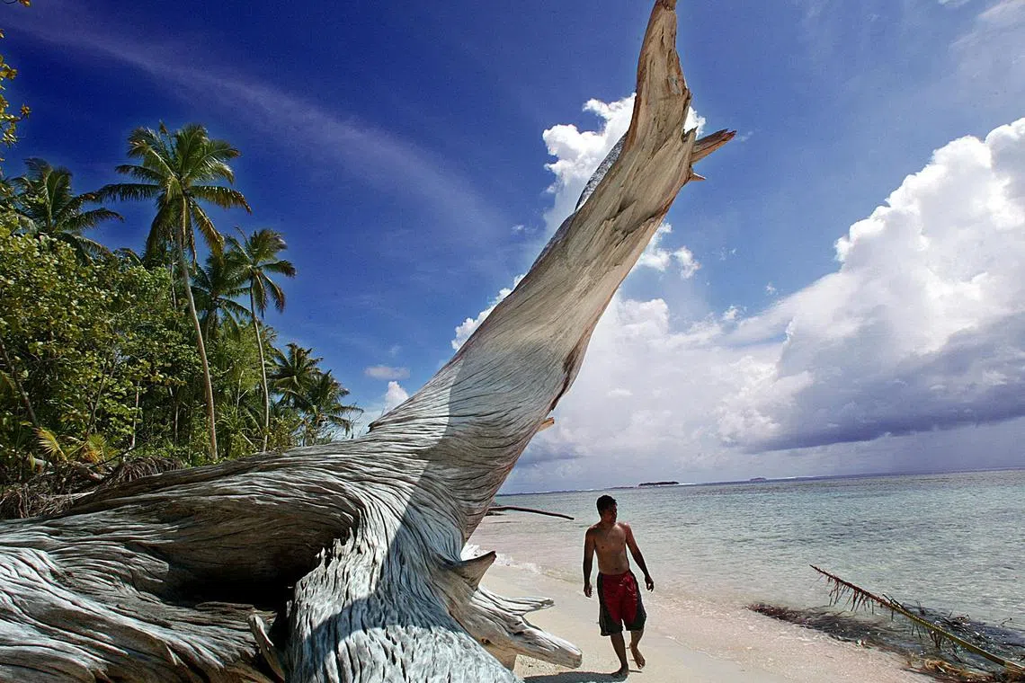 Nearly one-third of citizens in Pacific nation Tuvalu are seeking a landmark climate visa to live in Australia as rising seas threaten their palm-fringed shores.