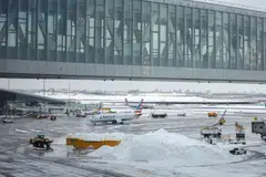 Above: LaGuardia Airport in New York on Monday (Jan 26). The potential cost of the winter storm is likely to be front of mind for investors when American Air and JetBlue Airways report fourth-quarter earnings this week.