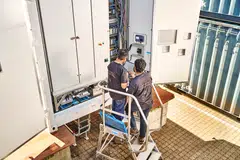 Amperesand engineers perform testing on its medium-voltage solid-state transformer power solution. The platform cuts installation labour needs by half and accelerates time to power by 10 times.