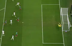 A freekick from Mexico's Luis Chavez beats Saudi Arabia's goalkeeper Al-Owais for Mexico's second goal during the Qatar 2022 World Cup match between Saudi Arabia and Mexico at the Lusail Stadium in Lusail, Doha, Nov 30, 2022. 