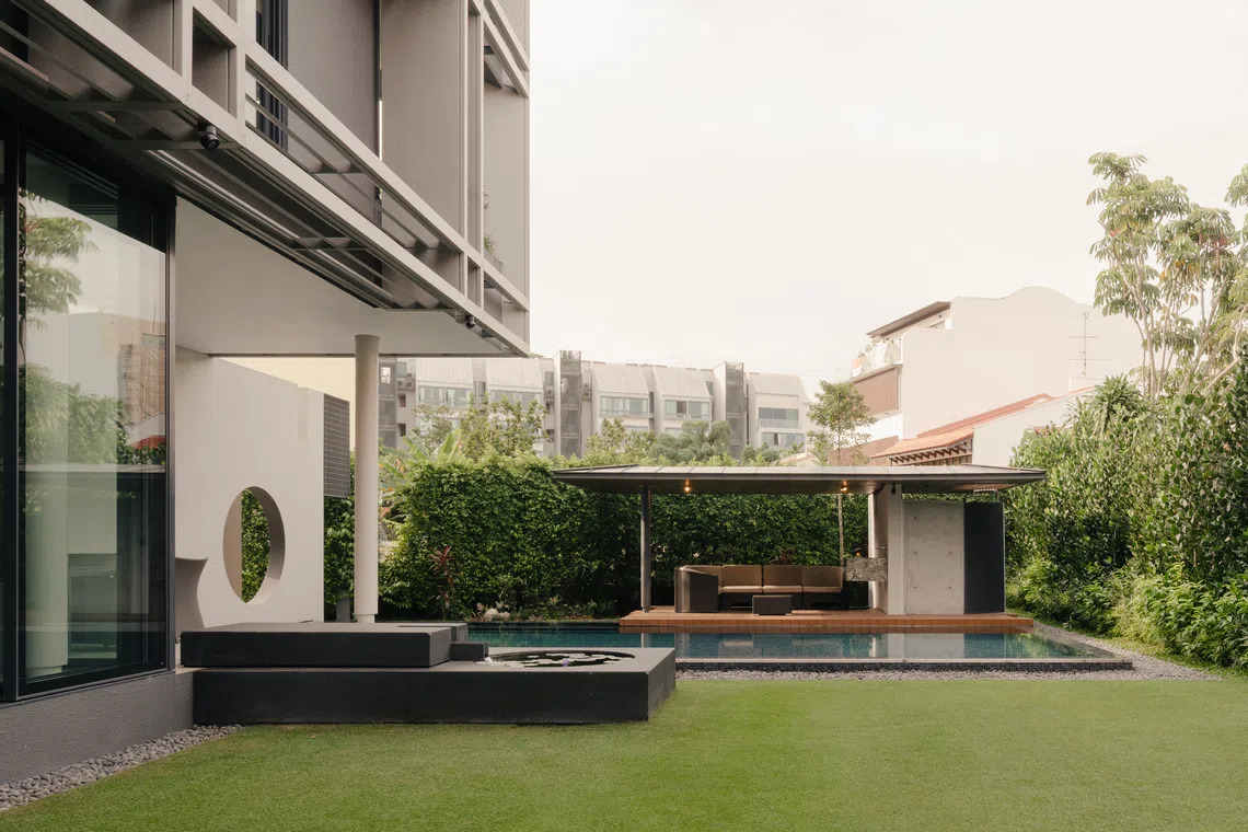 The home's lawn is shielded from prying eyes. 