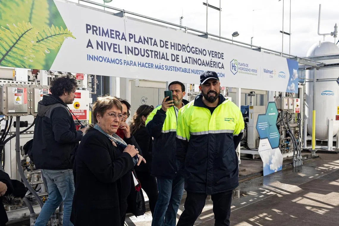 Chile's ex-president Michelle Bachelet (left) visits the first green hydrogen production plant in Latin America. New technologies such as green hydrogen can help to reignite growth in the region. 