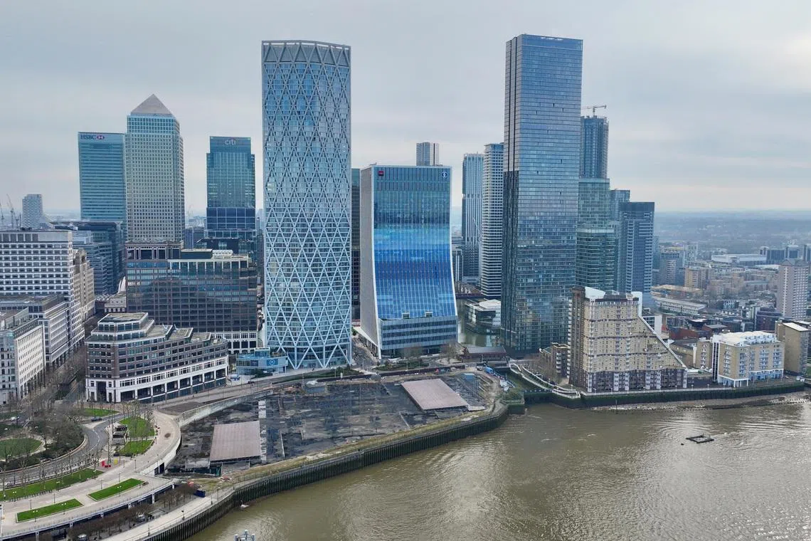 (Above) London's Canary Wharf financial district. Since 2019, almost four million sq ft of offices in the UK capital have been sold to investors who intend to convert them, data by CoStar Group showed.