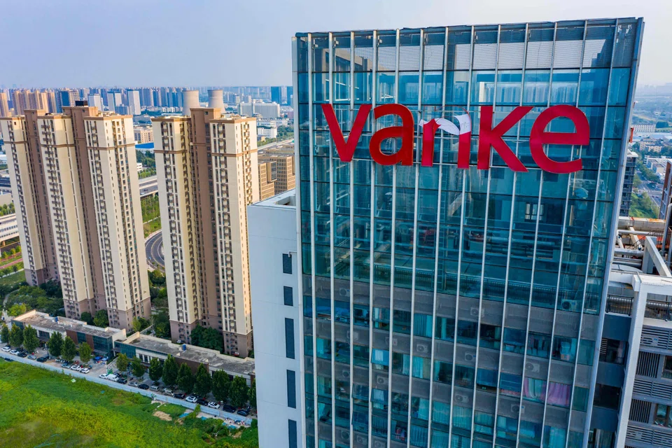 Shenzhen-based Vanke reported a net loss of 9.85 billion yuan (S$1.8 billion) in the six months ended June 30, its first on a semi-annual basis since at least 2003.