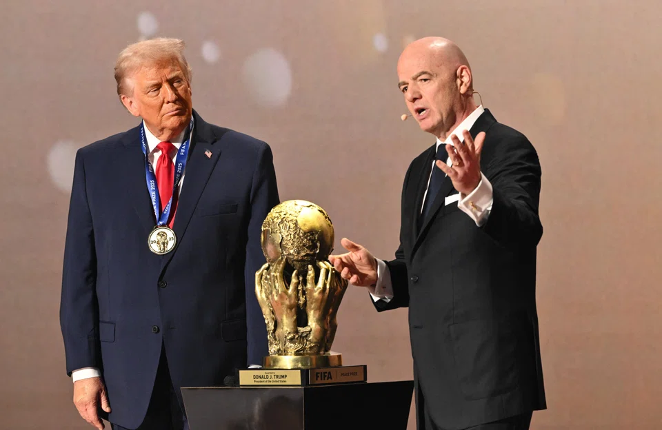 Fifa president Gianni Infantino (right) seems to have invented the Fifa Peace Prize as part of a wider effort to ingratiate himself and his organisation with President Donald Trump. The award was handed out at a glitzy draw event in Washington for the 2026 World Cup. 