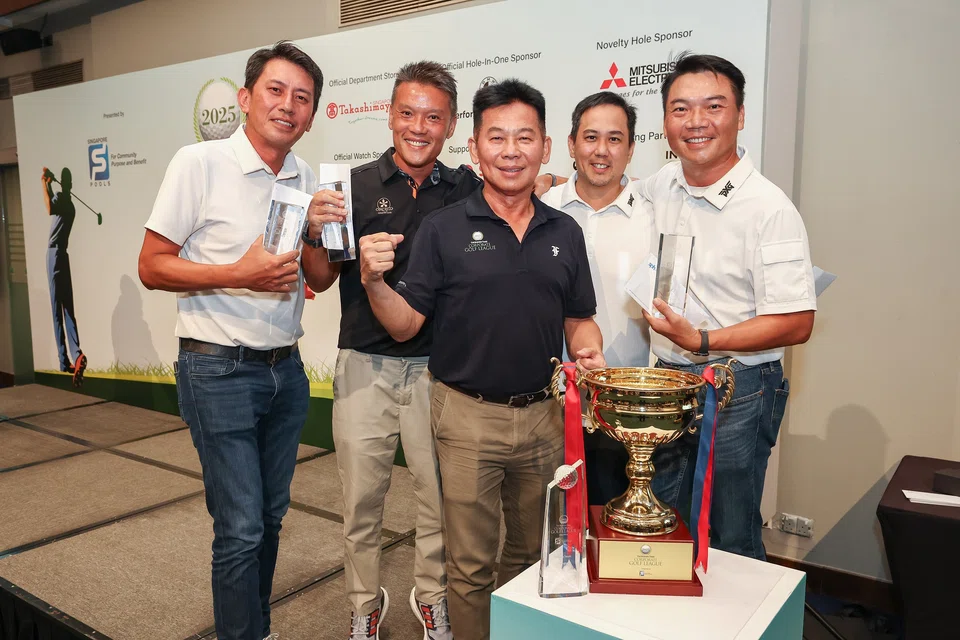 The golfers from Team Orchid Country Club celebrate with the trophy they bagged for emerging tops in The Business Times Corporate Golf League 2025.