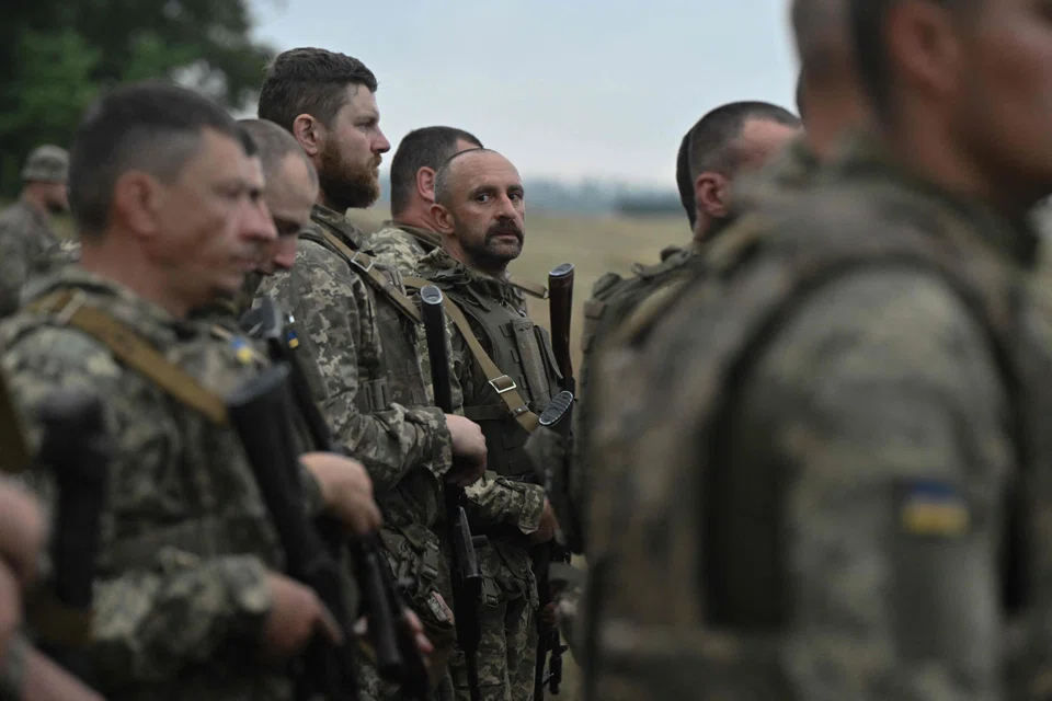 Ukrainian servicemen of the 33rd separate mechanised brigade. US President Donald Trump has threatened Russian President Vladimir Putin with further sanctions if no agreement to end the war is reached before an Aug 8 deadline.