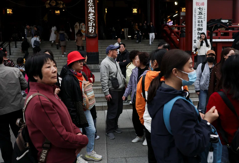 Chinese tourists at the Sensoji temple in Tokyo. Arrivals from China to Japan have been depressed in the wake of a recent diplomatic spat.