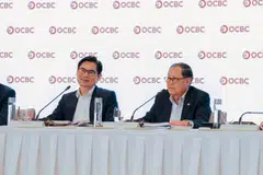 Andrew Lee, chairman of OCBC (right), and group chief executive Tan Teck Long speaking at Thursday's (Apr 16) AGM.