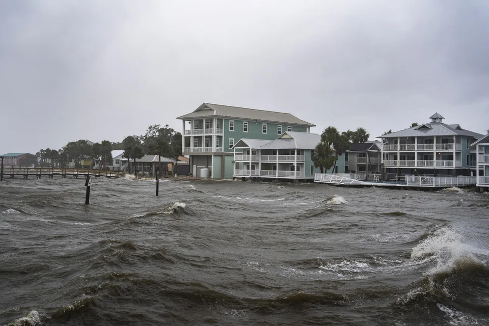 A damaged fence is seen after Tropical Storm Debby passed through in Cedar Key, Florida, Aug 5, 2024. 