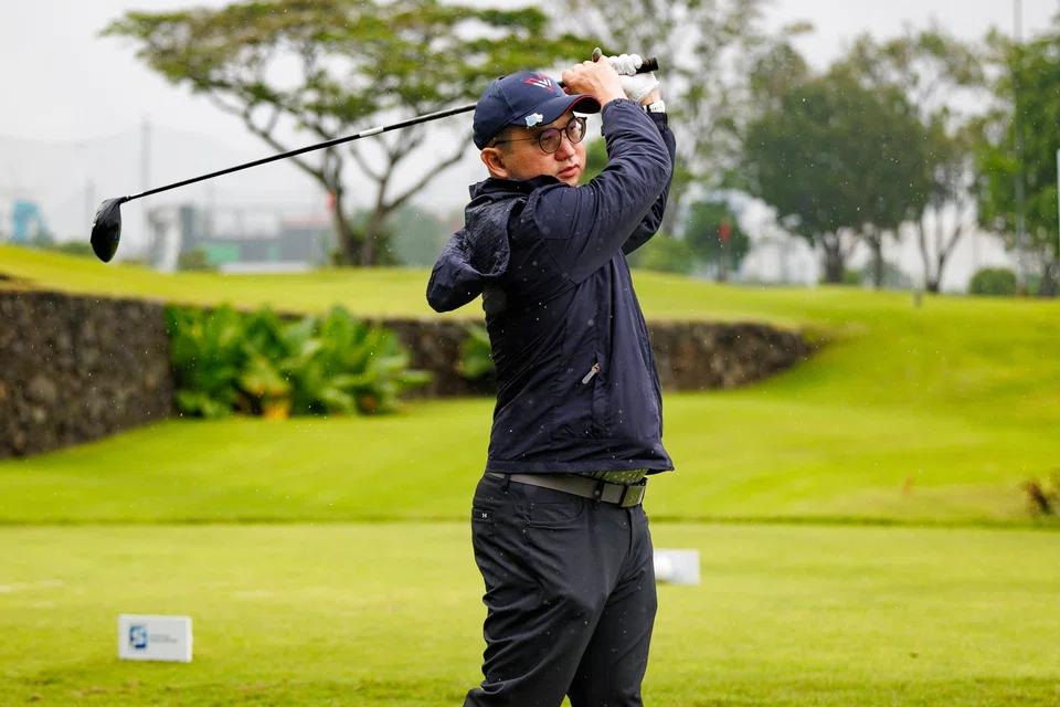 Singapore Pools CEO Lam Chee Weng in action at Tanah Merah Conutry Club during the BT Corporate Golf League 2023.