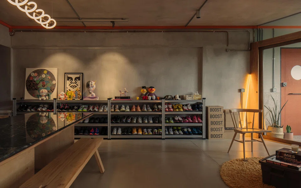 Keng's sneaker collection takes pride of place against one wall.