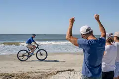 President Biden riding along the beach at Kiawah Island, South Carolina earlier this year; as a society, the United States is ageing, and working until later in life