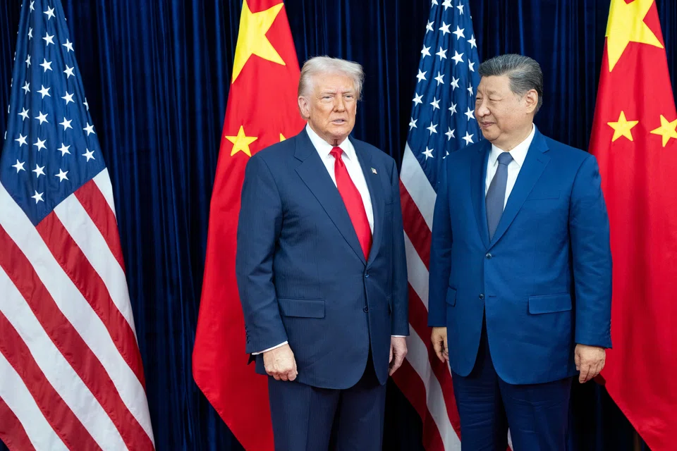 US President Donald Trump (left) with China President Xi Jinping at the Apec Summit in South Korea on Oct 30. Trump’s additional tariff on countries doing business with Iran could spark retaliation from Beijing, the primary purchaser of Iranian oil.