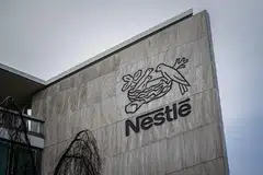 Nestle, the world’s biggest packaged food company, lowered its organic sales outlook to at least 3 per cent from about 4 per cent previously.