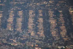 Debris from burned properties following the Palisades Fire at the Pacific Palisades neighbourhood in Los Angeles, California, Jan 10, 2025. 
