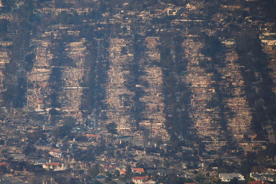 Debris from burned properties following the Palisades Fire at the Pacific Palisades neighbourhood in Los Angeles, California, Jan 10, 2025. 
