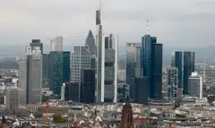The skyline of the banking district in Frankfurt. DZ Bank, Germany’s second-biggest by assets, raised risk provisions fourfold compared with the year-earlier period. Most other banks set aside more money as well. 