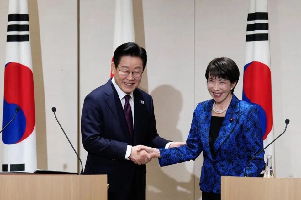 Japanese Prime Minister Sanae Takaichi (R) and South Korean President Lee Jae Myung discussed industrial supply chains, artificial intelligence, denuclearisation of the Korean peninsula and cooperation with the United States.