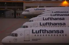 Germany’s Lufthansa says it plans to slash its net emissions by half by 2030 compared to 2019 levels and has a “constant dialogue” with customers. 