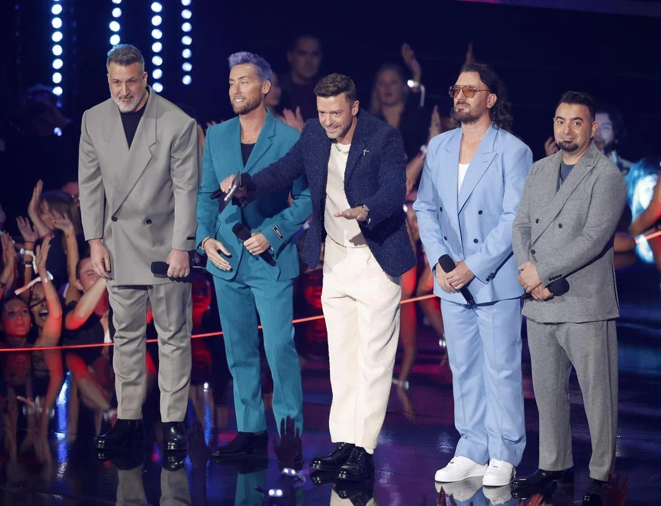 Justin Timberlake (centre), seen here with his former NSYNC bandmates, recently wrapped up his solo world tour, a tour that was criticised by some fans as lackluster.