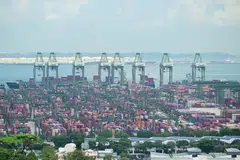 The increased demand on container handling in Singapore is a result of several container lines discharging more containers in Singapore as they forgo subsequent voyages to catch up on their next schedules.