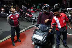 Indonesia has increased its fuel subsidy budget to shield people from the impact of rising global crude prices.
