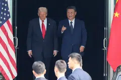 Trump (top left) has said that he struck a deal to reduce tariffs on China.