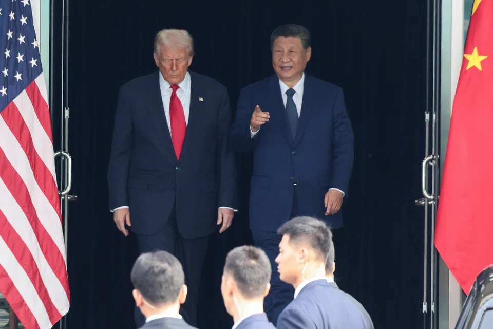 Trump (top left) has said that he struck a deal to reduce tariffs on China.