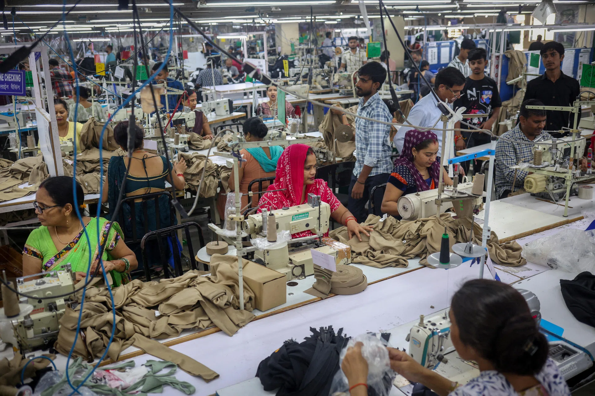 India's economy grows faster than expected in June quarter - The ...