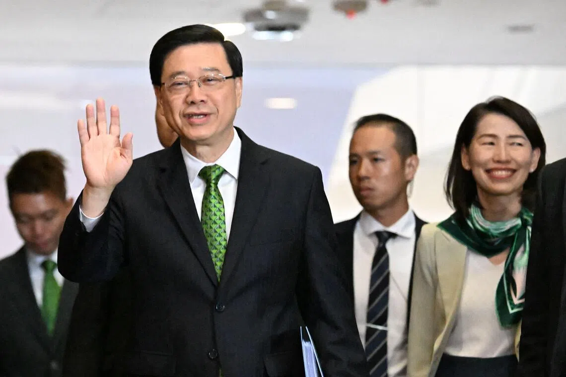 Hong Kong Chief Executive John Lee arrives at Central Government offices to deliver his annual policy address on September 17, 2025. (Photo by Peter PARKS / AFP)