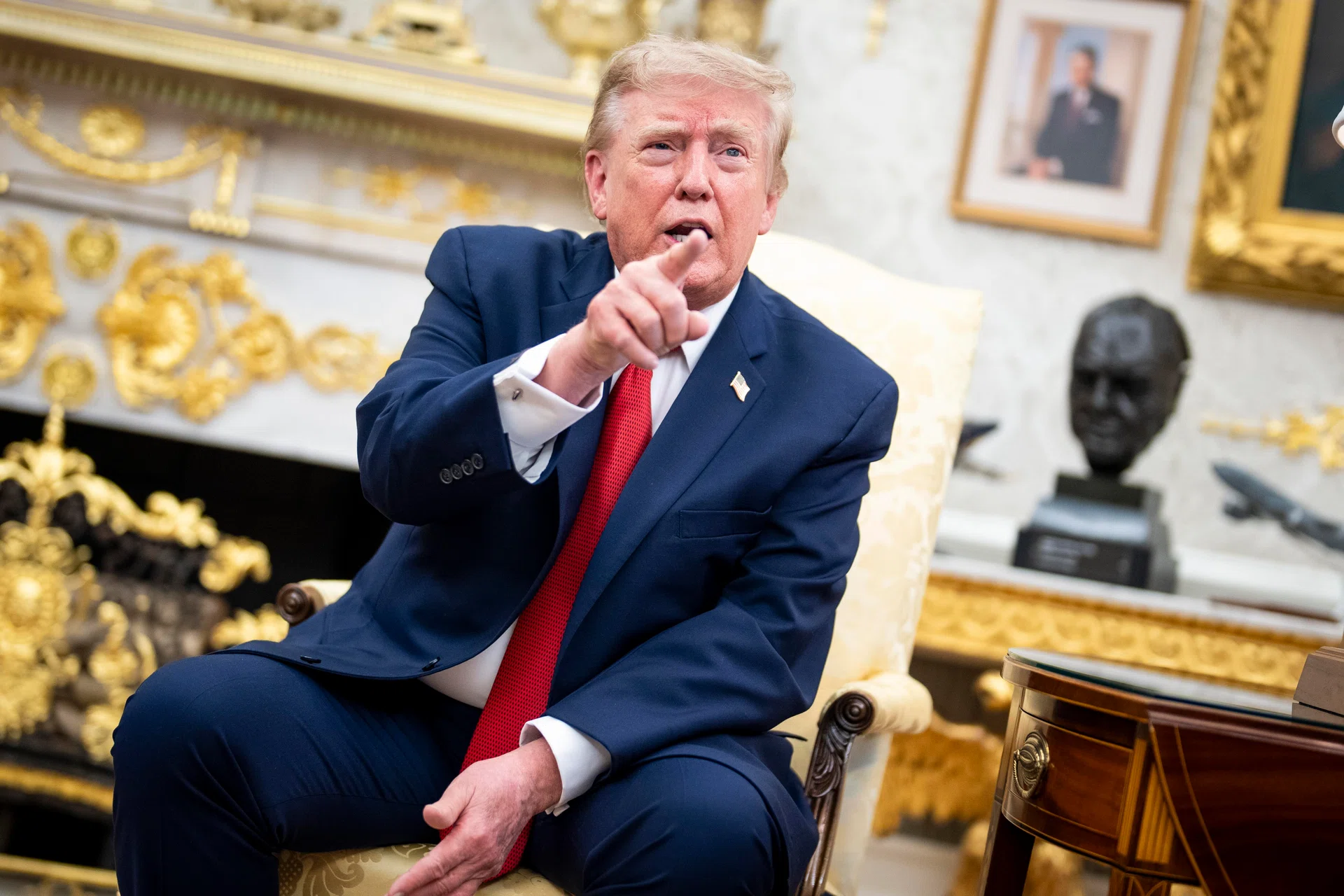 Trump vows to double Canadian auto tariffs, escalating fight