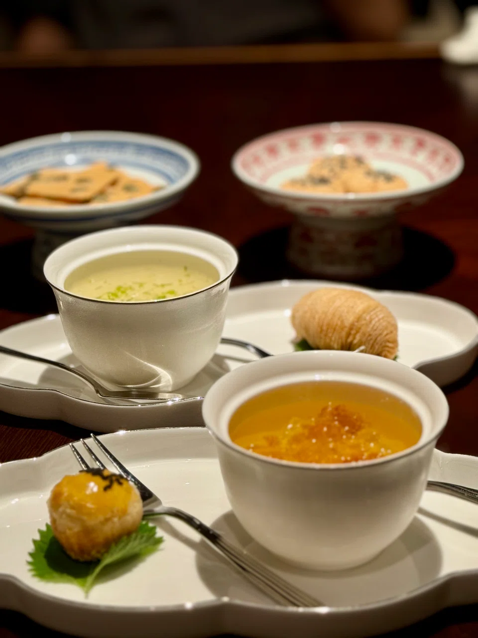 Lemongrass jelly with peach gum (front) and Tremella soup with waterchestnut and lime.