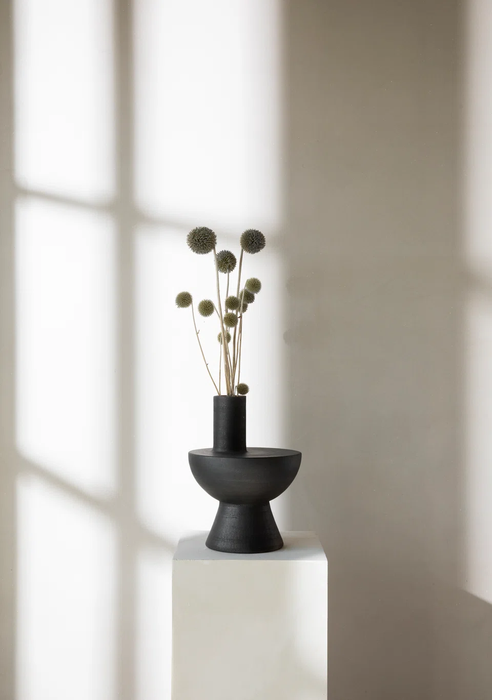 An Origin Made vase designed by Tan and made by a local artisan using an old Portuguese technique. 