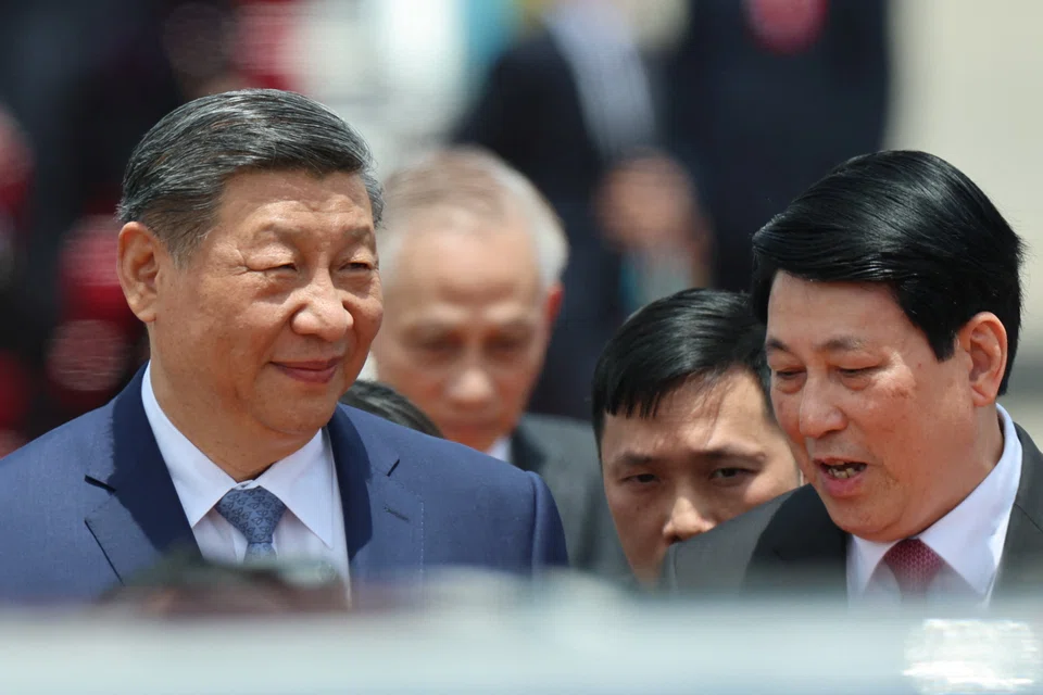 Chinese President Xi Jinping (left) is on a three-country tour of South-east Asia from Apr 14 to 18 amid an escalating trade tensions with the US. He arrived Hanoi on Monday for a two-day state visit.