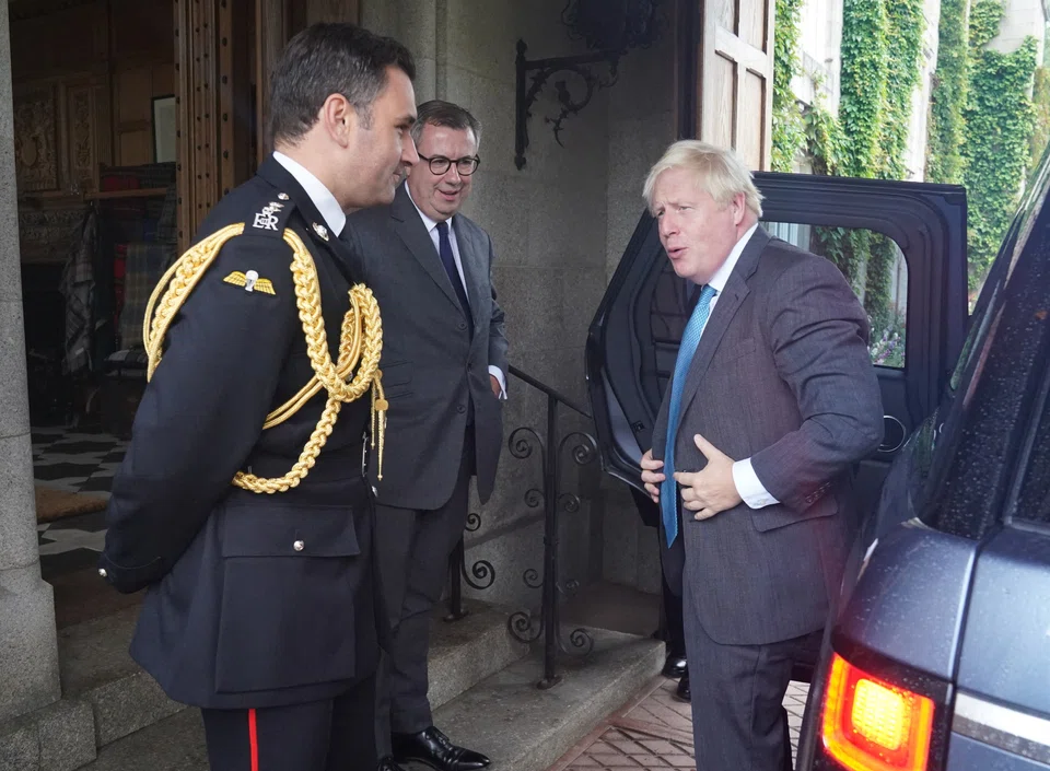 Outgoing British Prime Minister Boris Johnson arrives at Balmoral Castle for an audience with Britain's Queen Elizabeth, in Aberdeenshire, Scotland, Britain September 6, 2022. 



