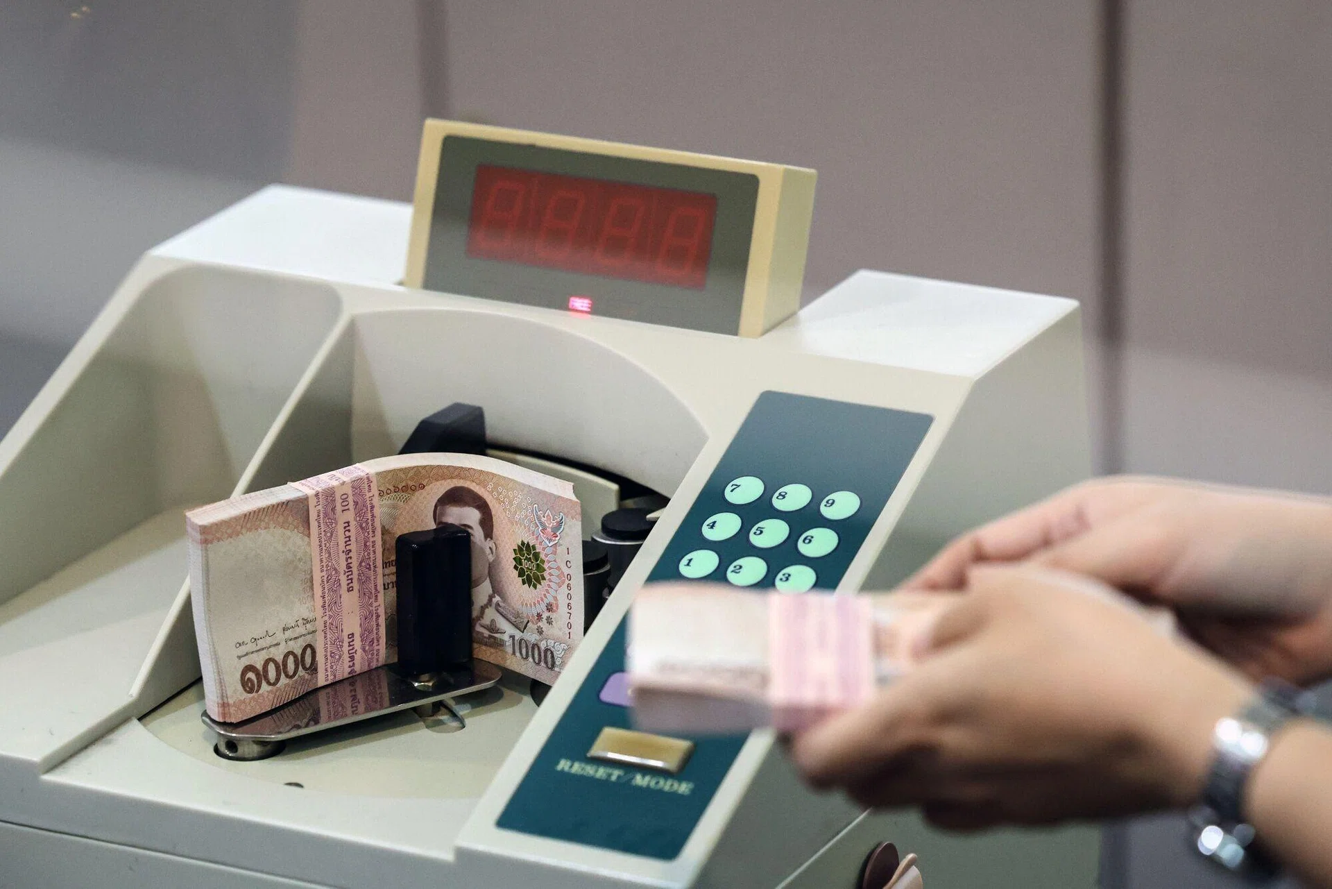 Thailand vows to curb baht swings as currency hits 4-year high