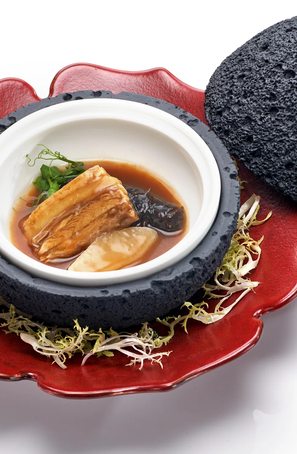 Braised duck and sea cucumber in hawthorn-infused sauce.