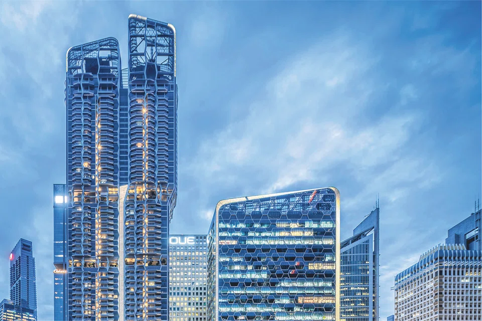 The 54-storey V on Shenton (left) comprises 510 apartments. It is part of a mixed-use project by Singapore Land Group that also includes the adjacent 23-storey UIC Building, comprising mostly offices.