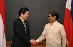 Singapore's Prime Minister Lawrence Wong (left) with Philippine President Ferdinand Marcos Jr at Malacanang Palace in Manila. 