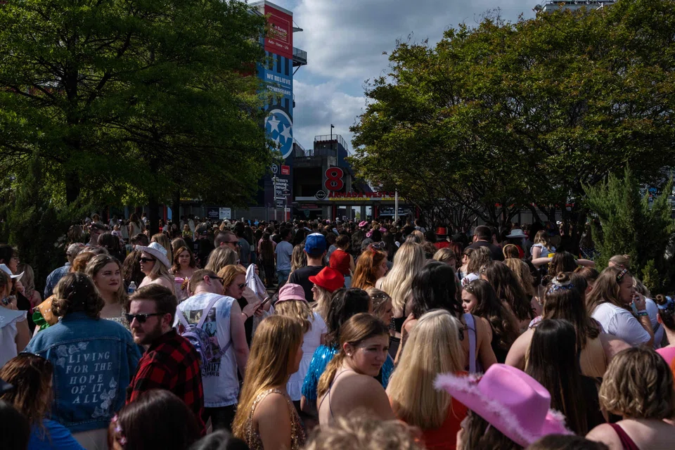 Fans wait in line outside Nissan Stadium ahead of artiste Taylor Swift's second night of performance on May 6, 2023 in Nashville, Tennessee. 