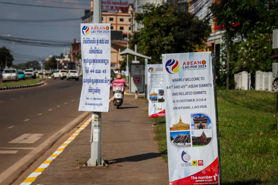 Asean Summit posters deck lamp posts on the streets of Laos' capital city.