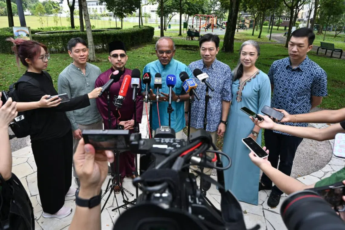 (From left) MP Louis Ng, Dr Syed Harun Alhabsyi, Law and Home Affairs Minister K Shanmugam, MPs Derrick Goh and Carrie Tan, and Jackson Lam speaking to the media outside Ahmad Ibrahim Mosque on March 31.