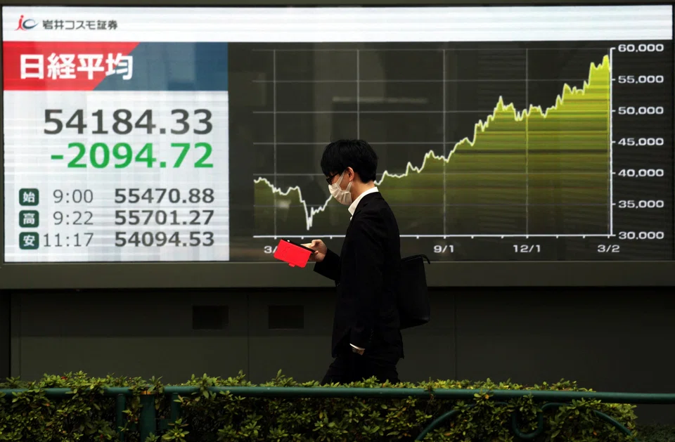 Japan’s Nikkei 225 and Topix indices are both down.